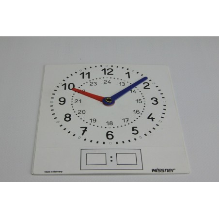 Horloge d'apprentissage blanche posée sur une table